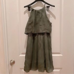 Cute olive green dress with lots of detailing. Excellent condition, size…